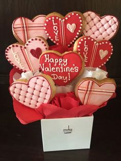 valentine's day cookies in a heart shaped box