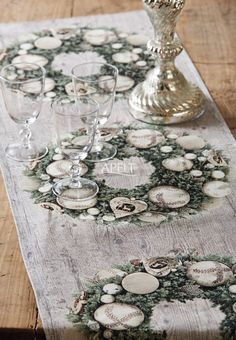 a table topped with lots of wine glasses