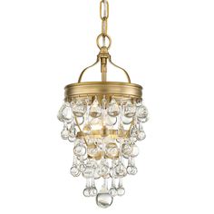 an antique brass chandelier with clear glass drops hanging from the bottom, on a white background