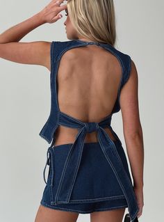 Dark wash denim top High neckline, open back with tie fastening, clasp fastening at back of neck Non-stretch material, unlined 100% cotton Cold hand wash Jeans Vest, Denim Skort, Women Y2k, Jean Vest, Y2k Clothes, Vest Fashion, Loungewear Sets, Party Tops, Dark Wash Denim