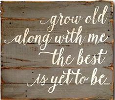 a wooden sign that says grow old along with me the best is yet to be