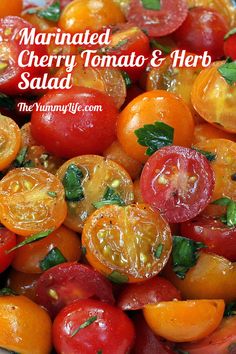 tomatoes and other vegetables are mixed together in a bowl with the words marinated cherry tomato & herb salad