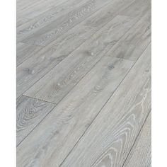 an image of wood flooring that looks like it has been painted in grey and white