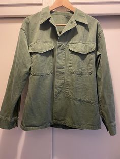 Vintage Dutch military shirt. The shirt is green with old style material. Pit to pit is approximately 20", arm length without cuff is approximately 20.5".  Contact us with any questions. Khaki Collared Military Shirt, Khaki Military Collared Shirt, Olive Military Style Tops For Fall, Green Military Style Button-up Shirt, Olive Military Style Button-up Top, Military Style Cotton Shirt For Fall, Olive Military Style Cotton Top, Olive Cotton Military Style Tops, Vintage Olive Long Sleeve Tops