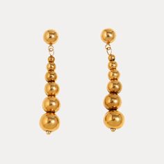 Elevate your style with our Beaded Drops, the perfect statement piece for any fashionista. These earrings are not only stylish but also hypoallergenic and waterproof for easy wear and care. Show off your unique fashion sense with these versatile and stunning earrings! Material: Stainless Steel (Gold-Plated) Width: 7 mm Height: 39 mm Post Length: 12 mm Weight: 5 g Crystal Ear Cuff, Beaded Drop Earrings, Wedding Night, Stunning Earrings, Everyday Earrings, Bridal Shop, Wedding Looks, Pearl Studs, Easy Wear