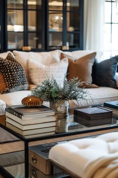 a living room filled with lots of furniture and pillows