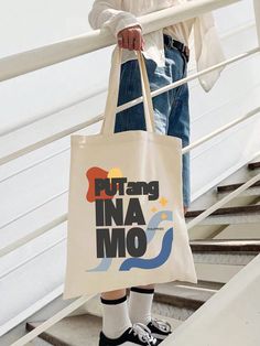 ✦ PUTANGINA PHILIPPINES TOTE BAG✦ A funny Filipino tote bag gift for all your Filipino friends and family!  Your new go-to everyday tote bag! The best tote bag for gifting! Perfect for your weekly shopping trips and everyday use. An abstract shapes design with two comfortable 20" shoulder straps made from 100% natural cotton canvas fabric. It is heavyweight making it extremely durable, and will last for years to come. ✦MORE INFO✦ * One size: 15" x 16" * Material: 12 oz/yd² (406.9 g/m²) heavy nat Fun Rectangular Shoulder Bag Gift, Fun Rectangular Shoulder Bag As Gift, Graphic Print Rectangular Canvas Bag Gift, Graphic Print Tote Shoulder Bag As Gift, Rectangular Canvas Bag With Letter Print For Gift, Eco-friendly Letter Print Shoulder Bag Gift, Abstract Shapes Design, Friend Present, Souvenir Ideas