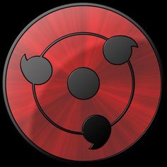 a red button with three black circles on the center and two black dots in the middle