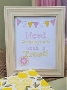 a framed sign that says need something sweet grab a treat with lemons on it