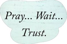 a sign that says pray wait trust