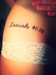 a woman's thigh with the word lazach written on it and a lace garter