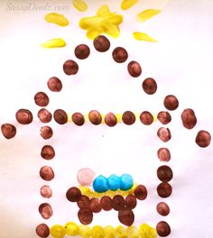 a child's craft made out of chocolate eggs