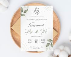 a wedding card on a plate with cotton