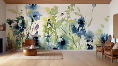 a living room with flowers painted on the wall