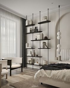 a bedroom with white walls and wooden flooring, shelving units on the wall