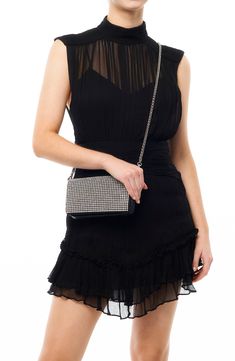 A crystal-encrusted clutch with a slim profile is topped with a convertible chain strap that can be worn on your shoulder or across your body for versatility. Structured silhouette with flat base for stability Lined Synthetic/glass crystal Imported Glass Crystal, Chain Strap, Convertible, Nordstrom, Shoulder Bag, Chain, Crystals, Glass, Black