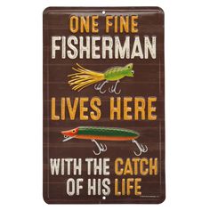 a sign that says, one fine fisherman lives here with the catch of his life