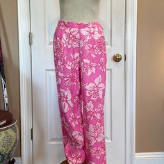 Lilly Pulitzer Silk Pink Floral Pants Size 8 Retired & Very Hard To Find Print. Pink And White Flowers Features Zip Up The Side With Button Closure And Sit At The Bottom Pant Legs 100% Silk Measure Approximately Nine Flat Waste 14 3/8 Of An Inch Rise 11 1/2 Inches Inseam 31 1/4 Inches Length 40 In A Quarter Inches New Without Tags Smoke Free Business Pink Full-length Bottoms For Vacation, Stretch Floral Print Bottoms For Daywear, Fitted Floral Print Pants For The Beach, Fitted Pink Pants For Daywear, Pink Floral Print Bottoms For Daywear, Pink Floral Print Full-length Bottoms, Full-length Pink Floral Print Bottoms, Full Length Pink Floral Print Bottoms, Fitted Floral Print Tapered Leg Pants