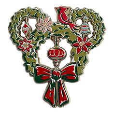 a christmas wreath with bells and bows on it