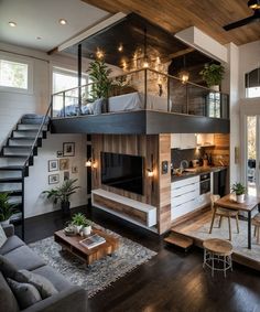 a living room filled with furniture and a fire place in the middle of a room