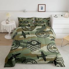 an army themed bed spread with two pillows