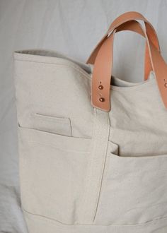 Construction Tote - Natural — LOCAL SHADE Everyday Bucket Canvas Bag With Pockets, Practical Canvas Bag With Pockets For On-the-go, Weekend Canvas Shoulder Bag With Pockets, Canvas Shoulder Bag With Pockets For Weekend, Practical Canvas Tote Bag With Pockets, Everyday Canvas Bag With Multiple Pockets, Working Person, Leather Handles, Cotton On