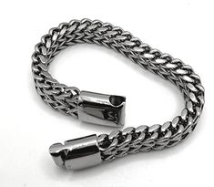 Due to the thickness of this bracelet, men's wrist sizes from 7.5 to 8 inches in circumference are perfect for this bracelet. 12mm chain bracelet Bracelet length 8.5 inches width 12 Made of stainless steel Learn how to measure your wrist here: https://www.youtube.com/watch?v=ypiuua7PR8o ► For longer lasting quality, please keep jewelry dry and away from chemicals. Jewelry care instructions come with every order. ► International orders are subject to tax/duty fees. This is uncontrollable on our e Adjustable Silver Stainless Steel Braided Bracelet, Silver Adjustable Cuban Link Bracelet For Everyday, Silver Stainless Steel Wristband With Jubilee Bracelet, Silver Stainless Steel Wristband, Silver Wristband With Stainless Steel Clasp As Gift, Silver Wristband Bracelet With Stainless Steel Clasp, Adjustable Silver Cuban Link Chain Bracelet, Silver Link Bracelet With Stainless Steel Clasp, Stainless Steel Braided Bracelet With Clasp