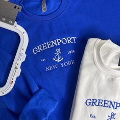 Greenport New York embroidered Crewneck Greenport New York Est 1838 with a doodle of an Anchor in the center on an White crewneck embroidery in blue threads. This crew neck is very cozy and has a classic look to match any outfit. UNISEX SIZING- fits true to size. Order up for an oversized fit 80/20 cotton/polyester blend fleece Every item is made in our studio Please allow up to 7 business days for your order to ship. CARE INSTRUCTIONS: All embroidered crews and hoodies can be washed and dried o Blue Crew Sweatshirt With Embroidered Graphics, Blue Embroidered Crew Sweatshirt, Crewneck Embroidery, New York Sweatshirt, White Crewneck, Embroidered Crewneck, Classic Looks, Sweat Shirt, Gender Neutral