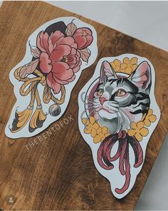 two stickers with cats and flowers on them