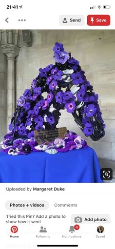 an image of purple flowers on a blue table cloth with the caption'uploaded by margret duke '