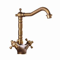 an old fashioned faucet with two handles and nozzles on the side