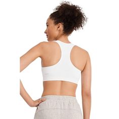 The Jockey Seamfree Mid Impact Sports Bra delivers stretchy softness for total comfort before, during and after your workout. Made with at least 62% recycled nylon in a smooth, Seamfree design, this sweat-wicking phenom features a ribbed underbust band for comfortable support during medium-impact activities. Finished with removable cups for customizable shaping and coverage, and a racerback design for superb range of motion, this Jockey sports bra is your go-to favorite for the gym and beyond. Soft Touch Medium Support Sports Bra For Yoga, Yoga Sports Bra With Medium Support And Soft Touch, Athleisure Sports Bra With Soft Touch For Gym, Yoga Athleisure Sports Bra With Soft Touch, Soft Touch Sports Bra For Yoga, Athleisure Sports Bra For Workout With Soft Touch, Soft Touch Athleisure Sports Bra For Workout, Supportive Soft Touch Sports Bra For Yoga, Supportive Soft Touch Athleisure Activewear