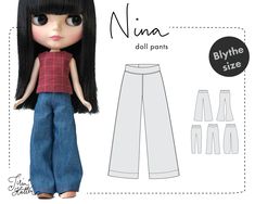 the doll is wearing jeans and a red shirt