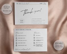 the wedding stationery is laid out on top of the satin material, and it has a thank you note in cursive writing