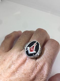 Cool Vintage Rock and Roll star men's ring Nice heavy ring, silver white bronze, wears like silver Unused stock from the 1980's I have an assortment of sizes from 7 to 8 9 10 11 12- 13 Please add your size to the order in a message and I will send the size you require. If I am out of stock in your size, I will list the ones I have available for replacement. If I am sold out in the sizes you would prefer, I will cancel and refund you, Thank you All jewelry is shipped in a nice gift box. Check out Symbolic Silver Metal Signet Ring, Symbolic Silver Signet Ring, Freemason Ring, Free Mason, Mens Stainless Steel Rings, Masonic Ring, Vintage Gothic, Vintage Rock, Native American Fashion