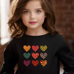 Colorful Hearts Sweatshirt with cute graphic designs.  Made with a comfortably balanced blend of 50% cotton and 50% polyester, the Gildan 18000B sweatshirt is the perfect choice for school, sports, and lounging with friends. Its medium-heavy fabric delivers a cozy, warm feeling while each sweatshirt runs true-to-size for a great fit.  .: 50% cotton, 50% polyester .: Medium-heavy fabric (8.0 oz/yd² (271.25 g/m .: Loose fit Cute Heart Print Tops For Winter, Cute Heart Print Tops For Fall, Cute Heart Graphic Tops For Fall, Cute Fall Tops With Heart Graphic, Cute Long Sleeve Tops With Heart Graphic, Cute Long Sleeve Top With Heart Graphic, Cute Crew Neck Sweatshirt With Heart Graphic, Cute Sweatshirt With Heart Graphic And Crew Neck, Cute Multicolor Long Sleeve T-shirt