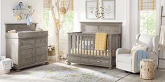 a baby's room with furniture and decor