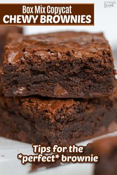 two brownies stacked on top of each other with the title box mix copycat chewy brownies tips for the perfect brownie