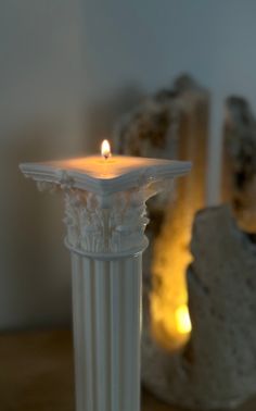 a candle that is sitting on a table