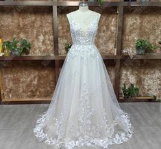 a - line scoop neck tulle appliques chapel train wedding dress