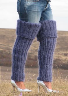 "HAND KNITTED GAITERS / LEG WARMERS ### DESIGNED & CREATED by Giorgio Qualitat ### Product Specification: § Color: Denim Melange; § Style: Ribbed hand knitted gaiters; § Material: 2 strands premium class longhair mohair; Size & Measurements: § Length: 35.8 \" / 91 cm § Circumference at the upper end: 18.1 '' / 46 cm § Circumference at the lower end: 8.7 '' / 22 cm § Net weight: 434 g* All measurements are taken with the item laid flat and not stretched. The lady modeling has a circumference at t Casual Hand Knitted Stretch Leg Warmers, Casual Stretch Hand Knitted Leg Warmers, Blue Fitted Casual Leg Warmers, Casual Fitted Blue Leg Warmers, Casual Fitted Knitted Leg Warmers, Blue One-size Leg Warmers For Fall, Blue Fitted Leg Warmers For Fall, Tight Casual Leg Warmers For Winter, Fitted Blue Leg Warmers For Winter