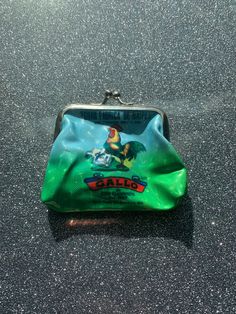 Coin bag with single loteria card animation ,size: 3inx2.5in Coin bag loteria card image ,size: 5inx4in Crossbody bag loteria image, size: 7.5inx5.5in Button Loteria image, size: 2.5inx2.5in Green Bags With Card Slots As Gift, Green Bag With Card Slots As Gift, Green Bags With Card Slots For Gifts, Vintage Green Wallets With Card Slots, Green Pouch Coin Purse With Card Slots, Green Coin Purse Pouch With Card Slots, Green Novelty Bags For Gifts, Retro Green Bags For Gifts, Green Rectangular Coin Purse With Coin Pocket