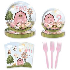 a set of pink plates with animals and farm scenes on them, along with forks and napkins