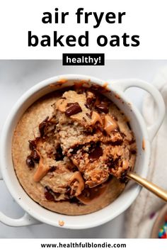 a bowl filled with oatmeal and topped with chocolate