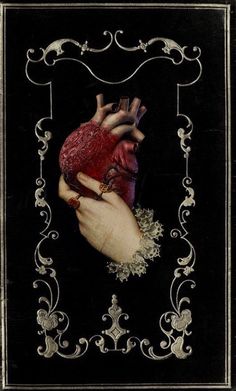 an image of a human heart being held by someone's hands with filigrees on it