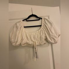 Had Plans To Wear This To An Outdoor Event In The Summer And Wore Something Else Instead. This Is Looks Adorable With Jeans Shorts But Could Be Worn A Bunch Of Different Ways During Warm Weather. Great Option To Just Have In Your Closet! White Puff Sleeve Crop Top For Day Out, White Puff Sleeve Crop Top For Brunch, Butterfly Cutout, Twist Front Crop Top, Cutout Crop Top, Mock Neck Crop Top, Sheer Crop Top, Baby Doll Top, Bandeau Crop Top