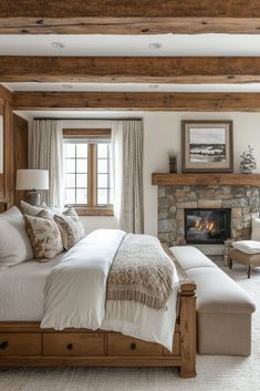 a bedroom with a fireplace and bed in it