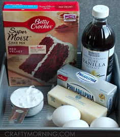 ingredients to make red velvet cake sitting in a baking tray