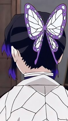 a person with purple hair and a butterfly on their head