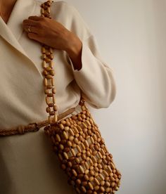 Wooden Beaded Bucket Bag, Beige Bamboo Handmade Shoulder Bag, Natural Wood Summer Bag With Linen Pouch Attention! Measurements in photos are in centimeters. In this shop, I produce stylish and timeless bags with my imagination. My bags are the combination of natural materials and handcraft. I design useful and different models with love. I can improve myself with your ideas and suggestions and produce bags according to your wishes. Let's design together! * Details Handmade item Proper for casual Beads Handbag, Beaded Bucket Bag, Wooden Bead Jewelry, Linen Pouch, Timeless Bags, Market Tote Bag, Bamboo Bag, Animal Bag, Pearl Bag